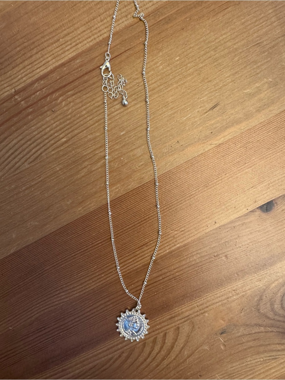 Silver Sunburst Pendant Necklace - gold Accent